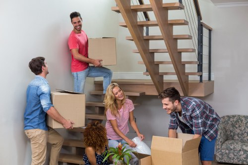 Professional movers handling a same day house removal