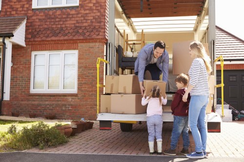 Movers Man With Van team preparing a safe home move with protective equipment