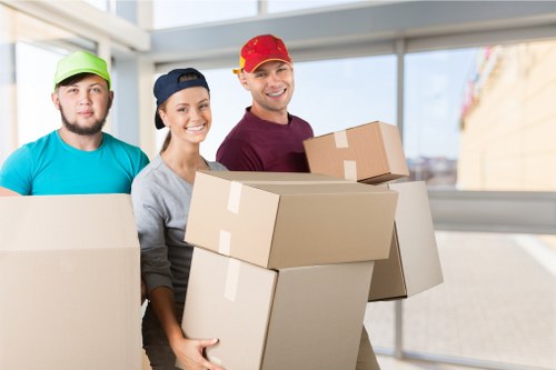 Moving van pricing and quote planning with packed boxes and furniture