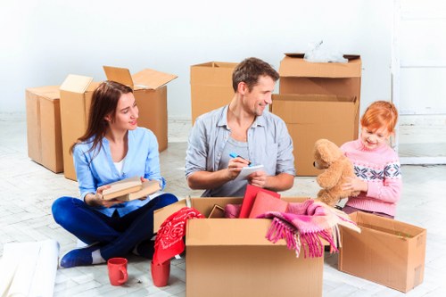 Professional movers handling heavy furniture during relocation