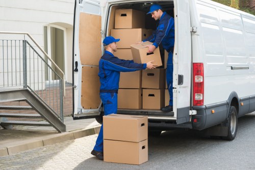 Workers and moving equipment representing ethical transport operations