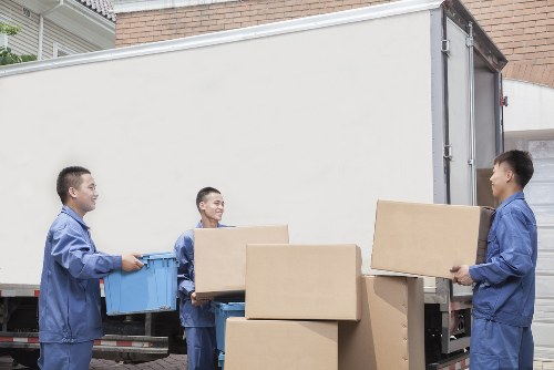 Removalists helping a family prepare essentials for moving day