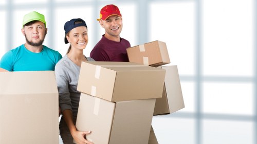 Movers reviewing health and safety procedures before transport