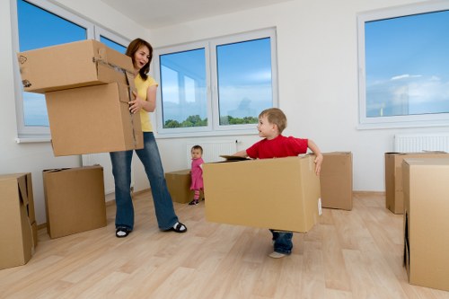 Moving team organizing packed cartons for a relocation service