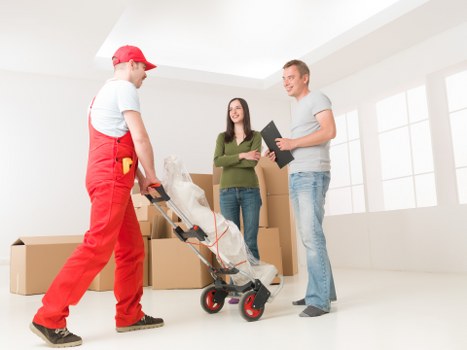 Business relocation team setting up a new workspace