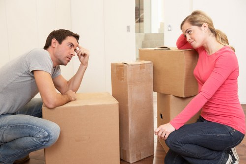 Careful movers protecting fragile furniture during transport