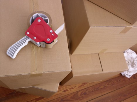 Movers helping with a student house relocation and luggage transport