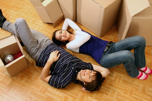 Professional student removals with packed boxes and furniture